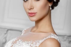 Beautiful bride in fashion wedding dress with diamond jewelry